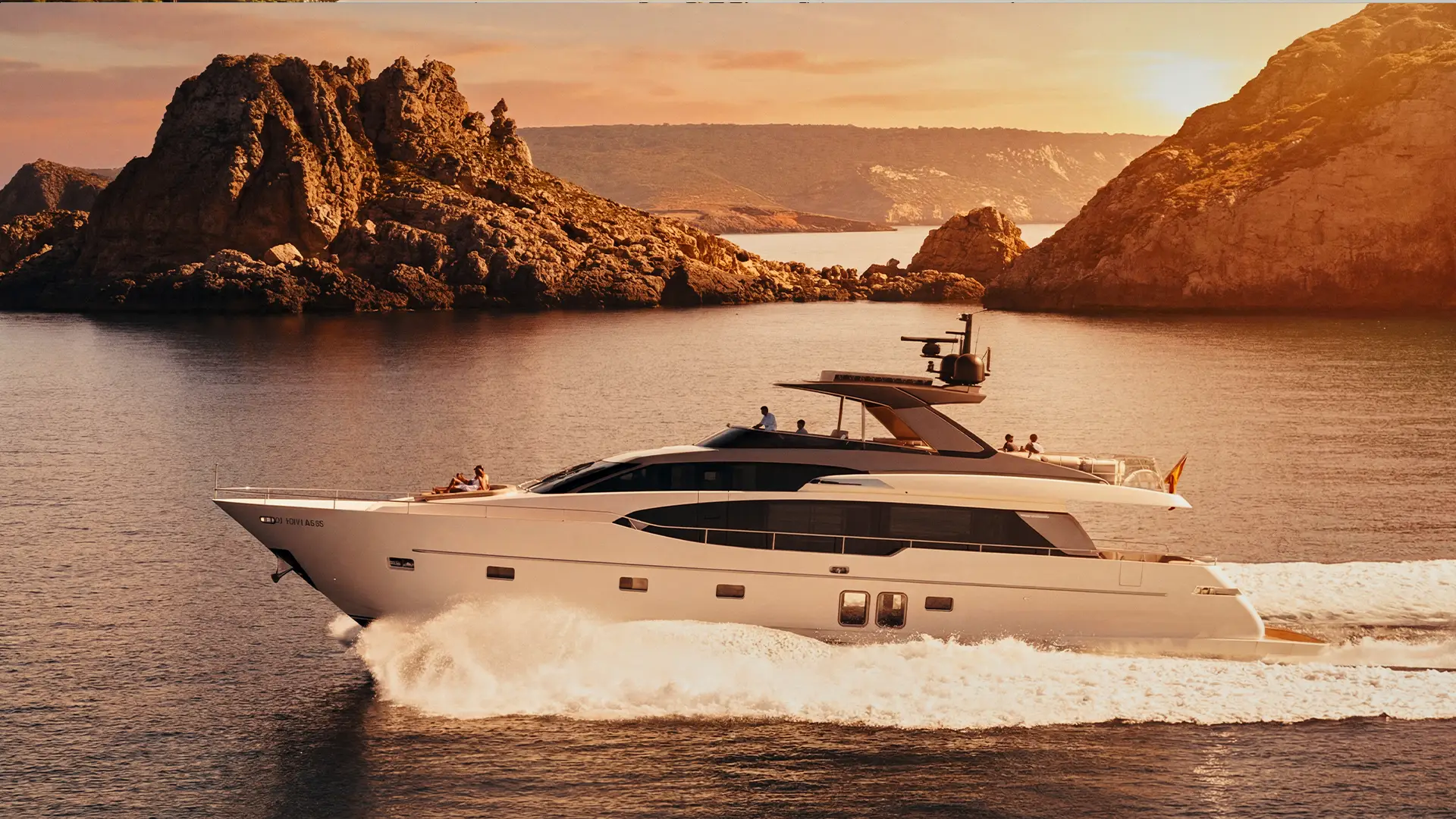 Aerial drone view of Sanlorenzo SL78 AURA I cruising through crystal clear waters near Mallorca